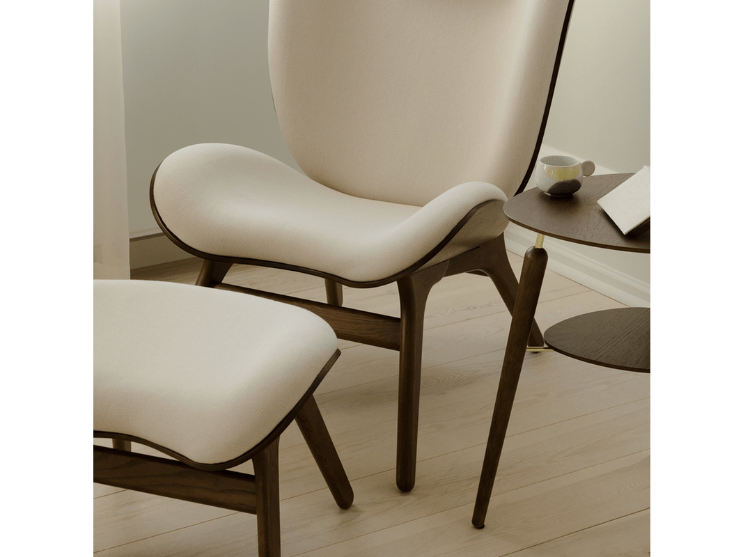 HORIZONS UPHOLSTERY | A CONVERSATION PIECE OTTOMAN